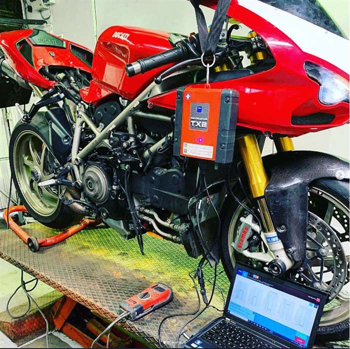 TEXA diagnostic unit and laptop connected to a Ducati at SNS Motorcycles