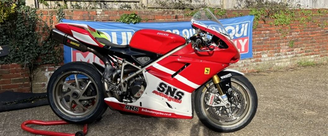 SNS Motorcycles' own Ducati in SNS colours, outside the workshop