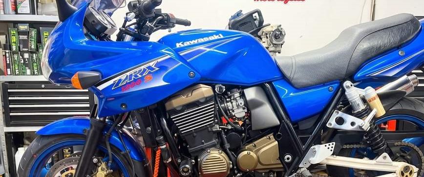 Ducati on the workshop lift with TEXA diagnostics connected during a service