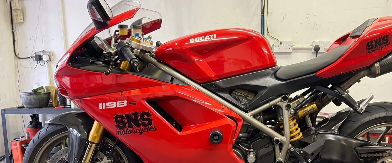 Ducati 1198S in SNS Motorcycles colours on the workshop bench