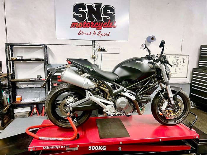 Ducati Monster on the lift at SNS Motorcycles