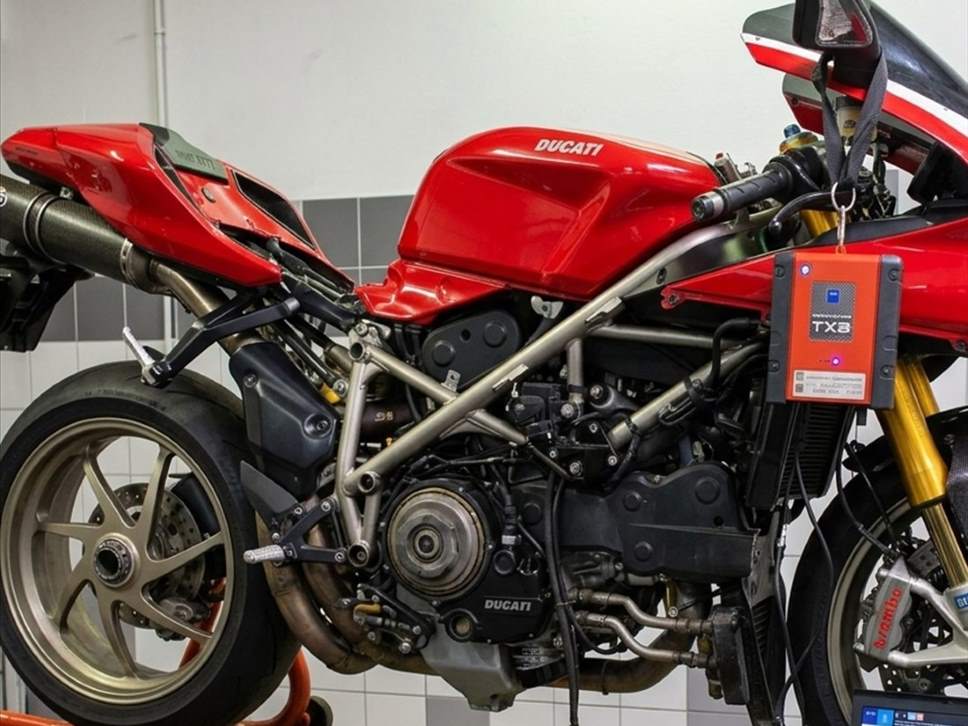 A Ducati on the ramp at SNS Motorcycles with a TEXA diagnostic unit connected